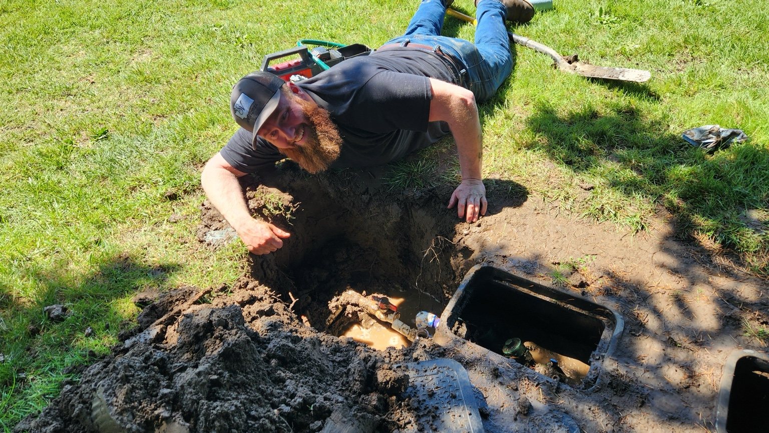 Right Direction Plumbing working at an underground water service and meter connection