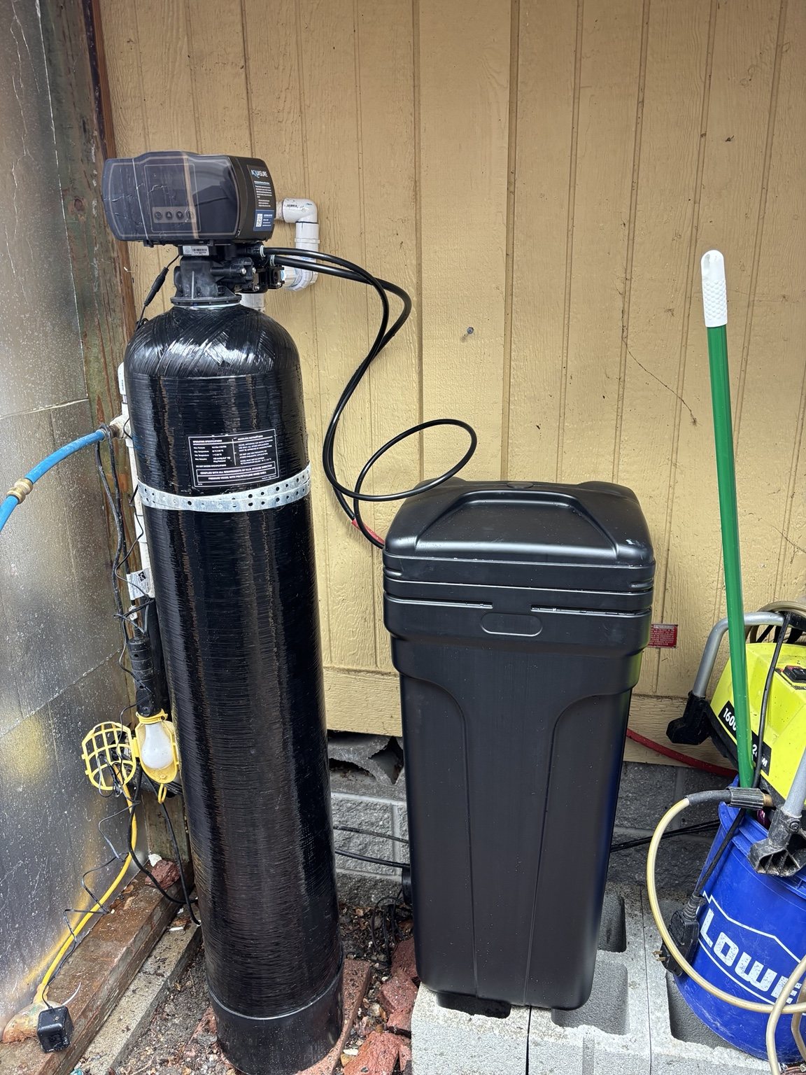 Whole-home water treatment and plumbing system